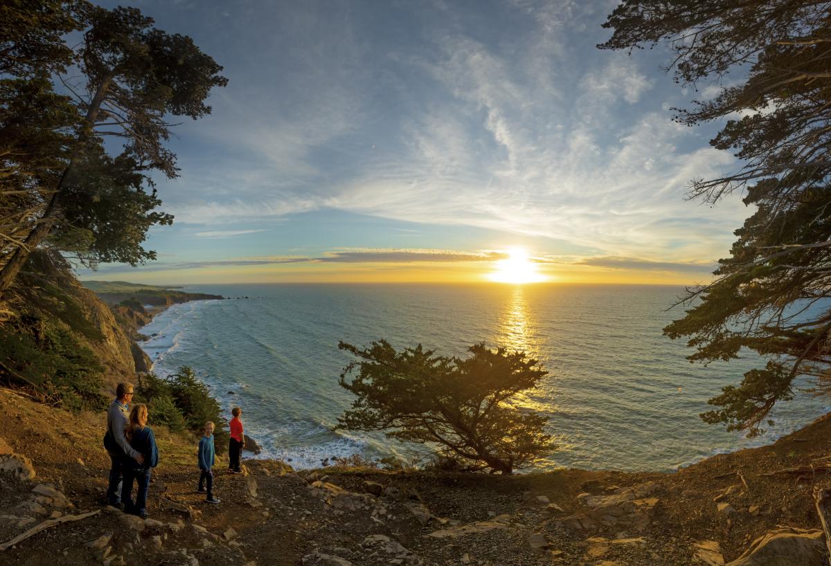 Family overlooking the view of Ragged Point