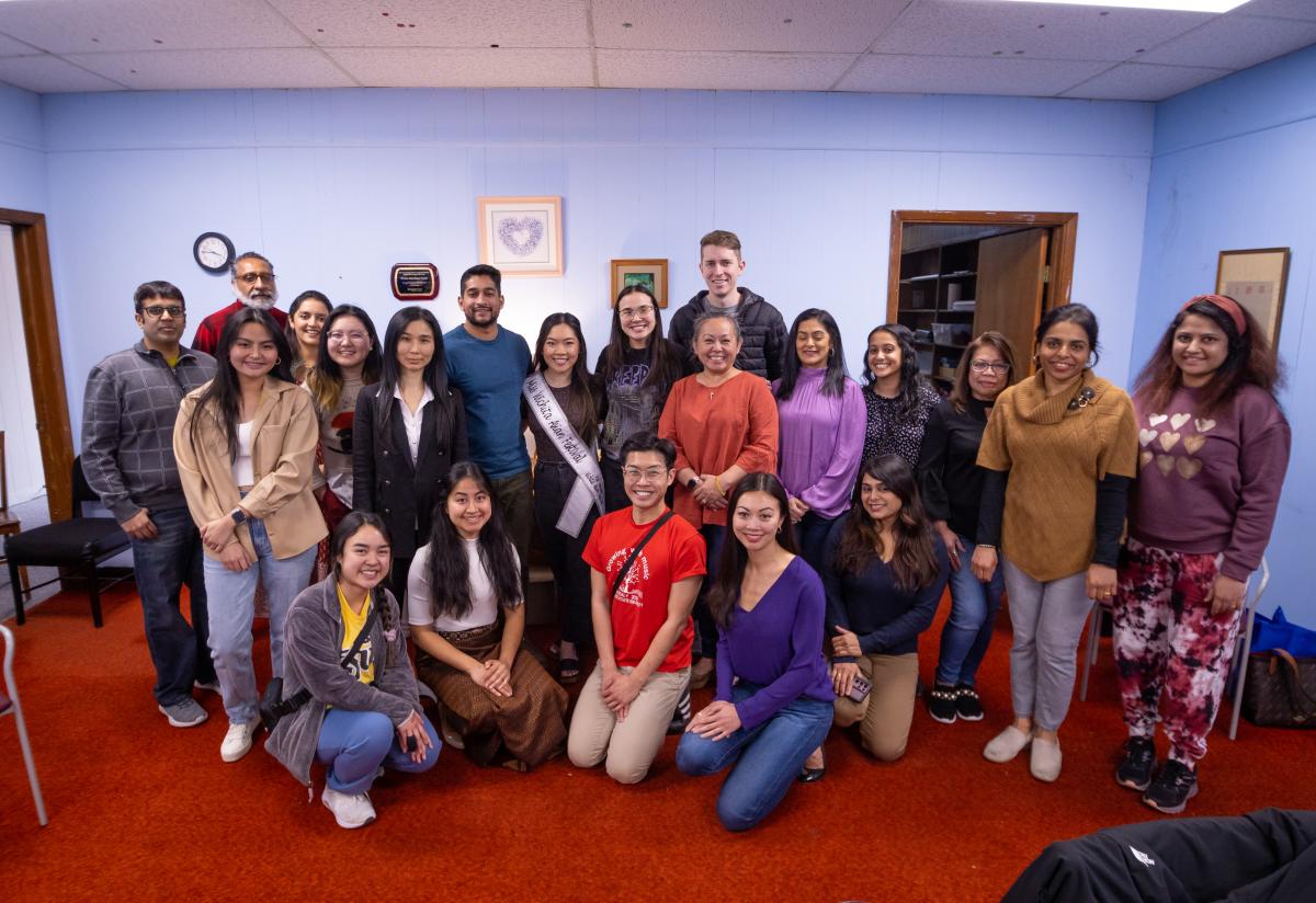 Members of the Wichita Asian Association pose for a group photo