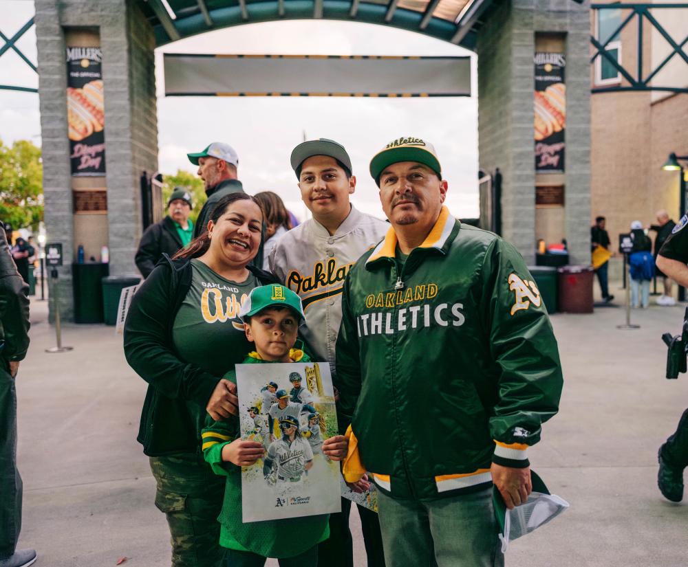 Family of four at an Athletics game in Sacramento