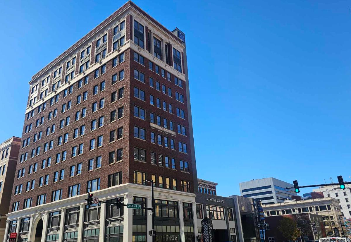 The AC Marriott Downtown hotel is photographed from the street on a sunny day