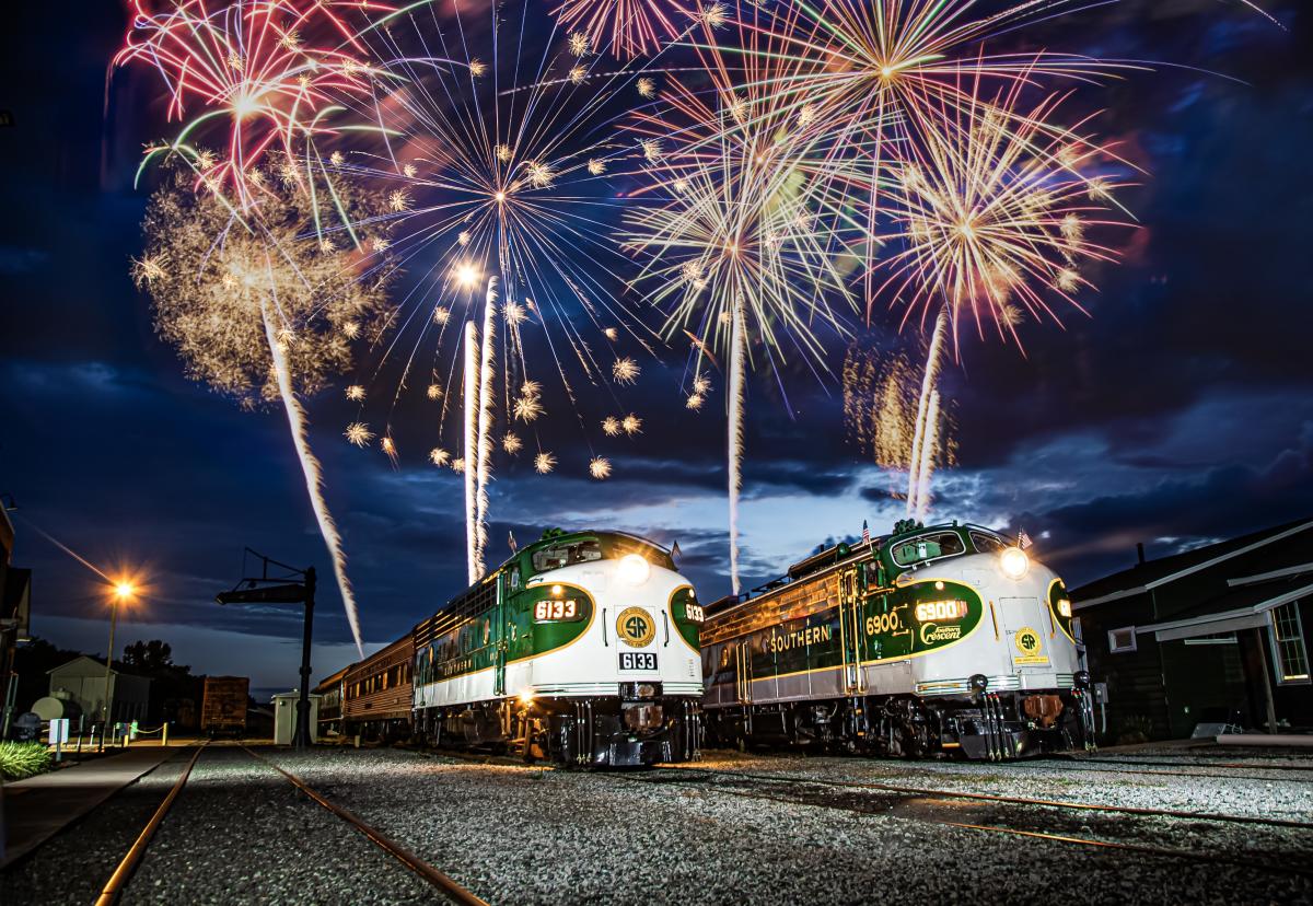 Fireworks over two train engines at the N.C. Transportation Museum