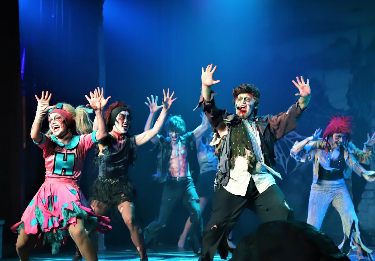 Dancers performing in Halloween costumes at Frontier City's Fright Fest.