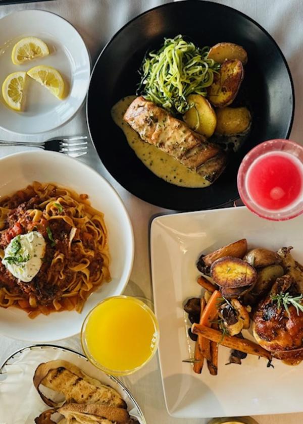 Plates of Italian food on a table