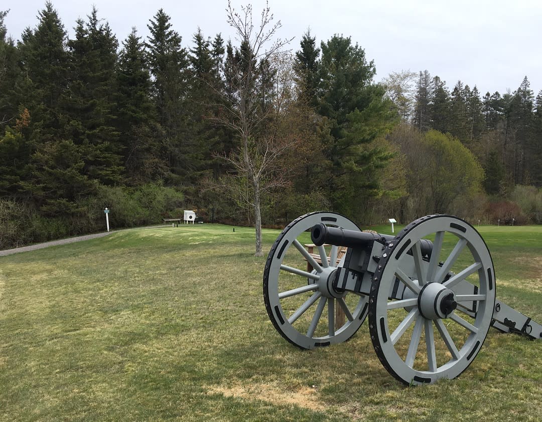 A cannon points over the land of Wawashkamo Golf Club, which is the site of the 1814 Battle of Mackinac Island