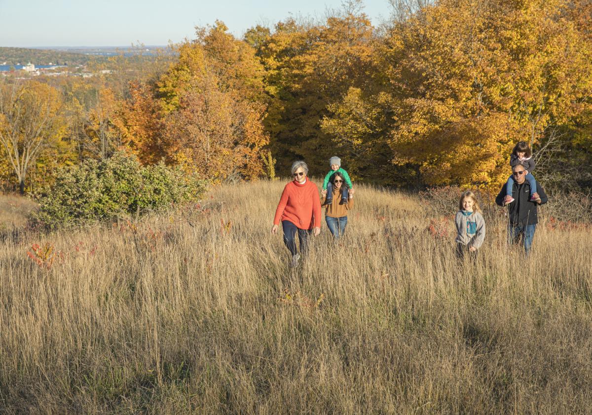 Family on a Fall Hike at the Grand Traverse Commons