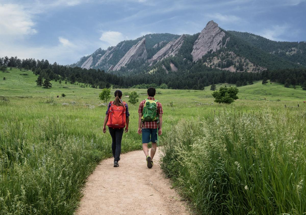 Man and Woman Hiking Chautauqua Flatirons in Boulder