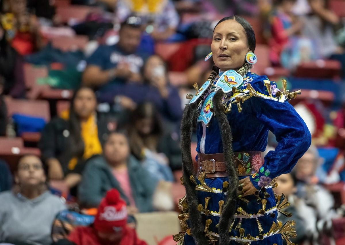 women's jingle dress dancer at the black hills powwow in rapid city, sd