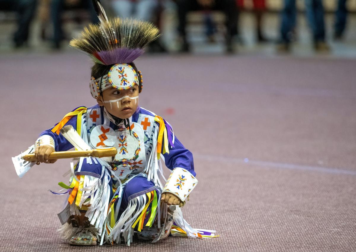 little kid dancing at the black hills powwow in rapid city, sd