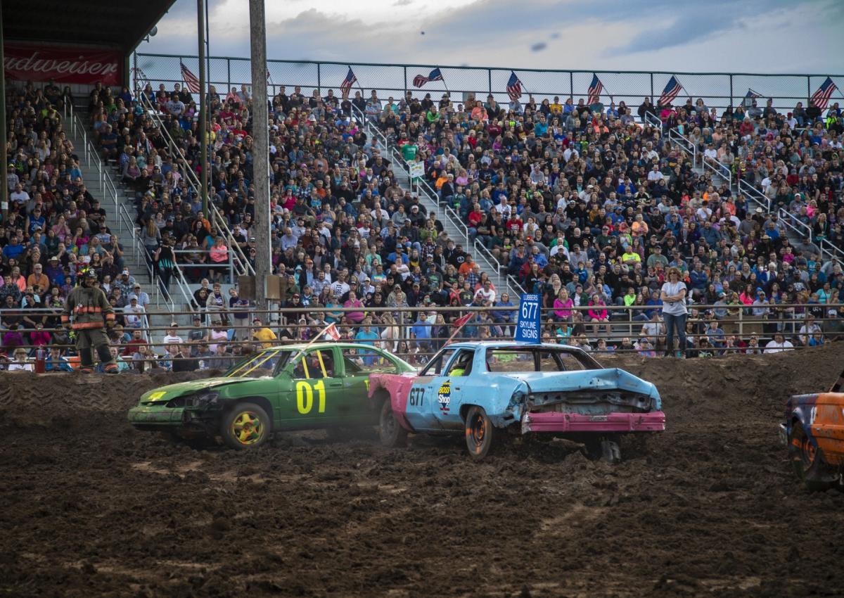 Demo derby action in the grandstands of the central states fair in rapid city, sd