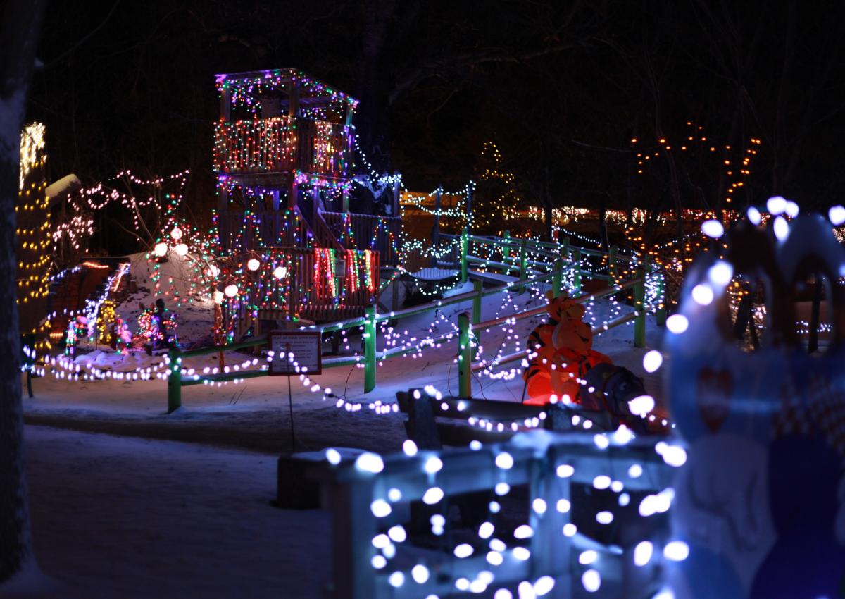 Play ground covered in christmas lights at storybook island's christmas nights of light event in rapid city, sd