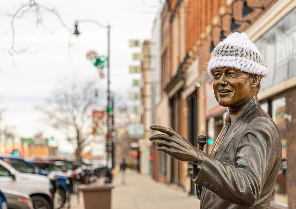 City of Presidents statue Bill Clinton wearing winter gear in downtown Rapid City, SD