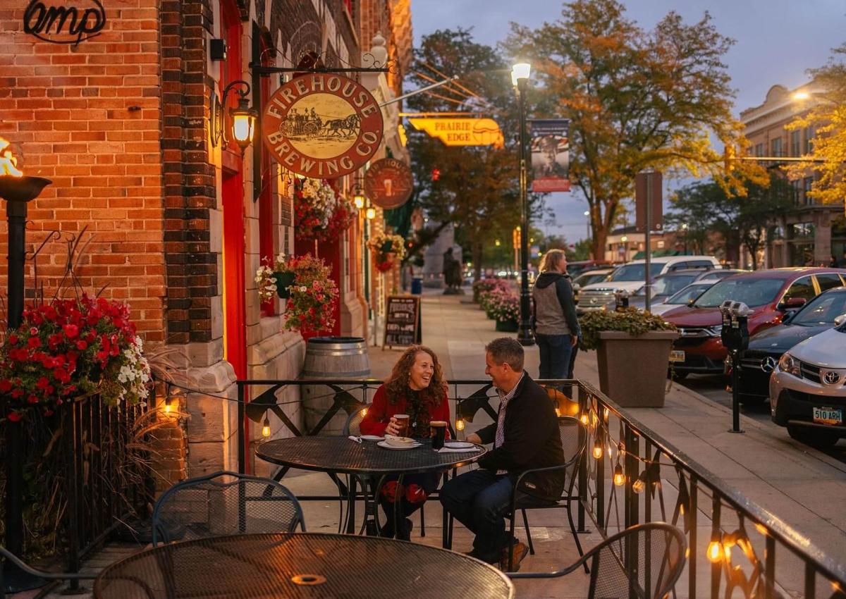 couple enjoying evening drinks on the patio of Firehouse Brewing Company in rapid city south dakota