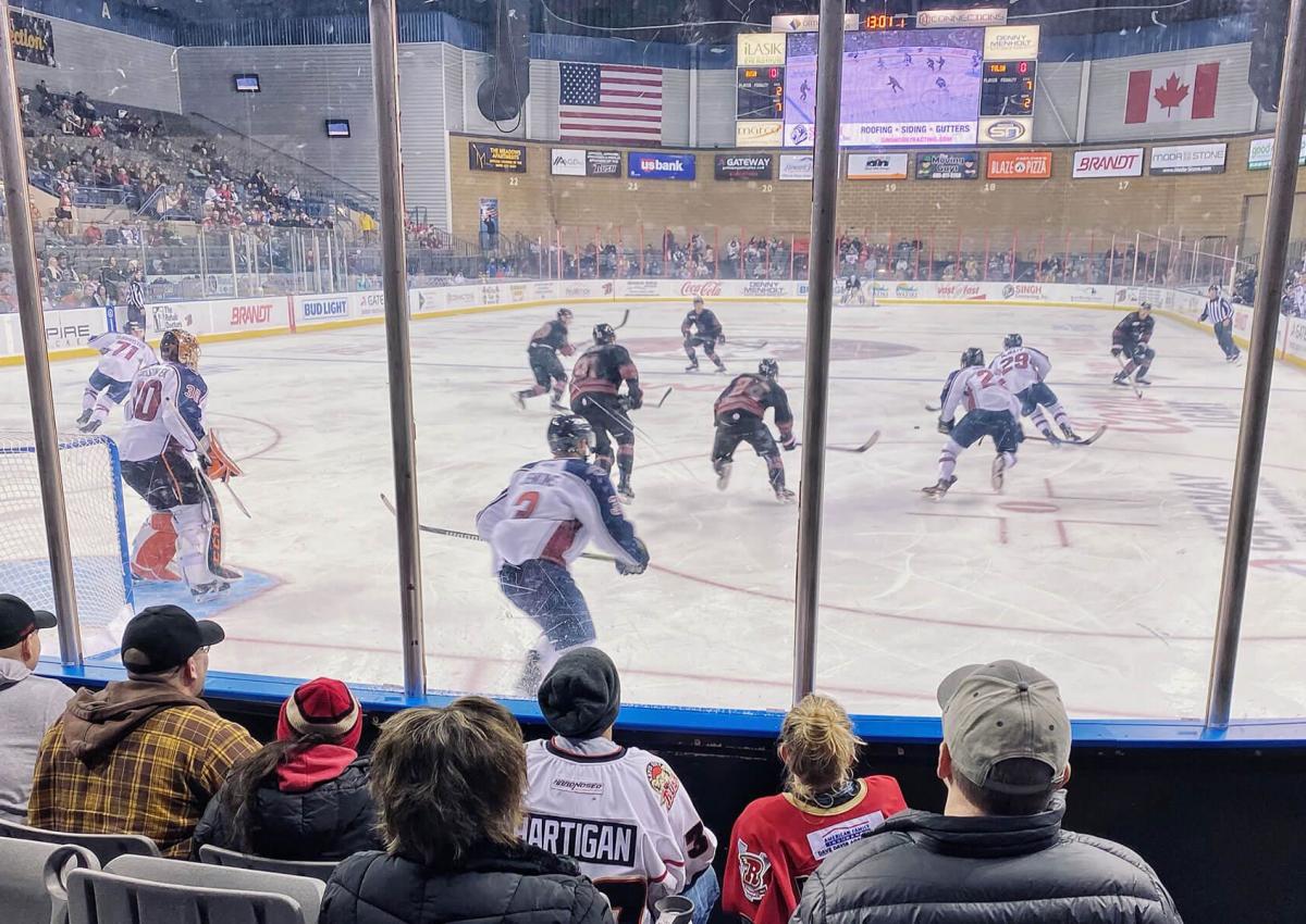 Rapid City Rush Hockey Game with Fans Cheering them on