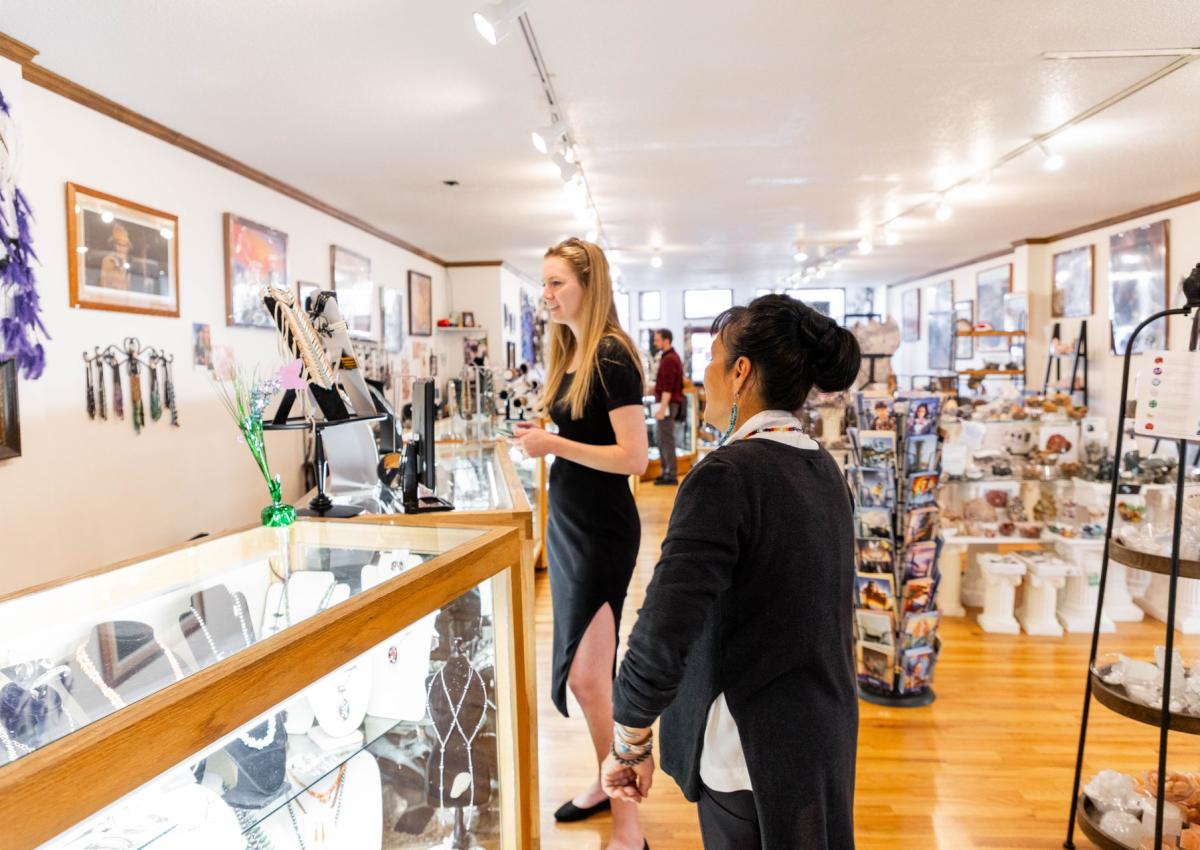 people shopping jewelry and stone selection on display inside southwest jewelry and gifts in Rapid City, SD