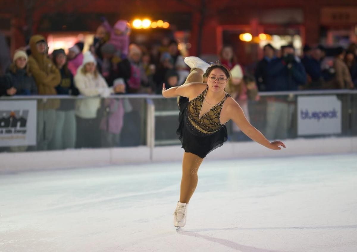 figure skating performance at main street square in rapid city during the winter market event