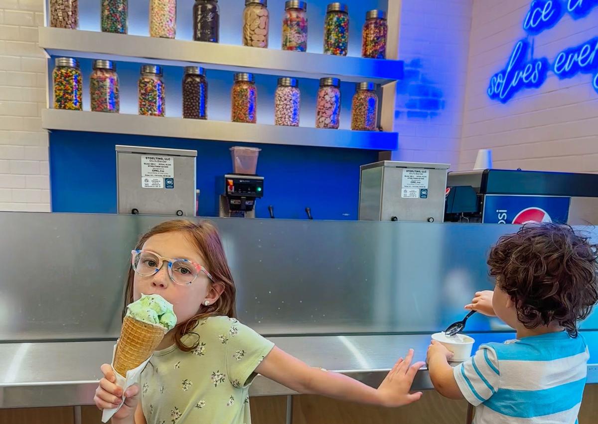 kids eating ice cream inside silver lining creamery in downtown rapid city, sd
