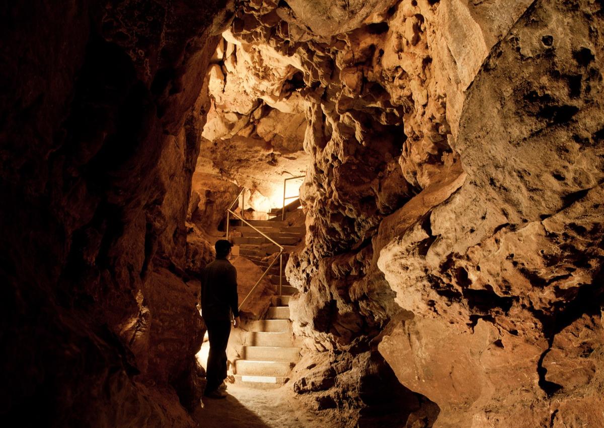 person touring rushmore cave at rush mountain adventure park in the black hills