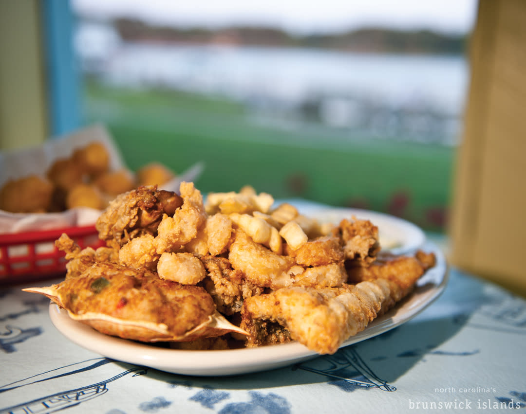 a Calabash-style platter of seafood with shrimp, flounder, deviled crab, and fries