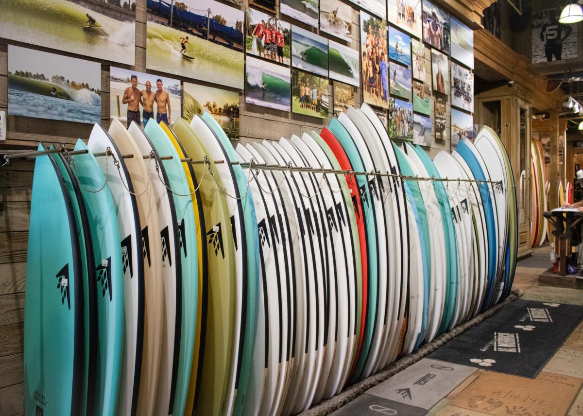 Huntington Surf & Sport Inside a picture of surfboards lined up