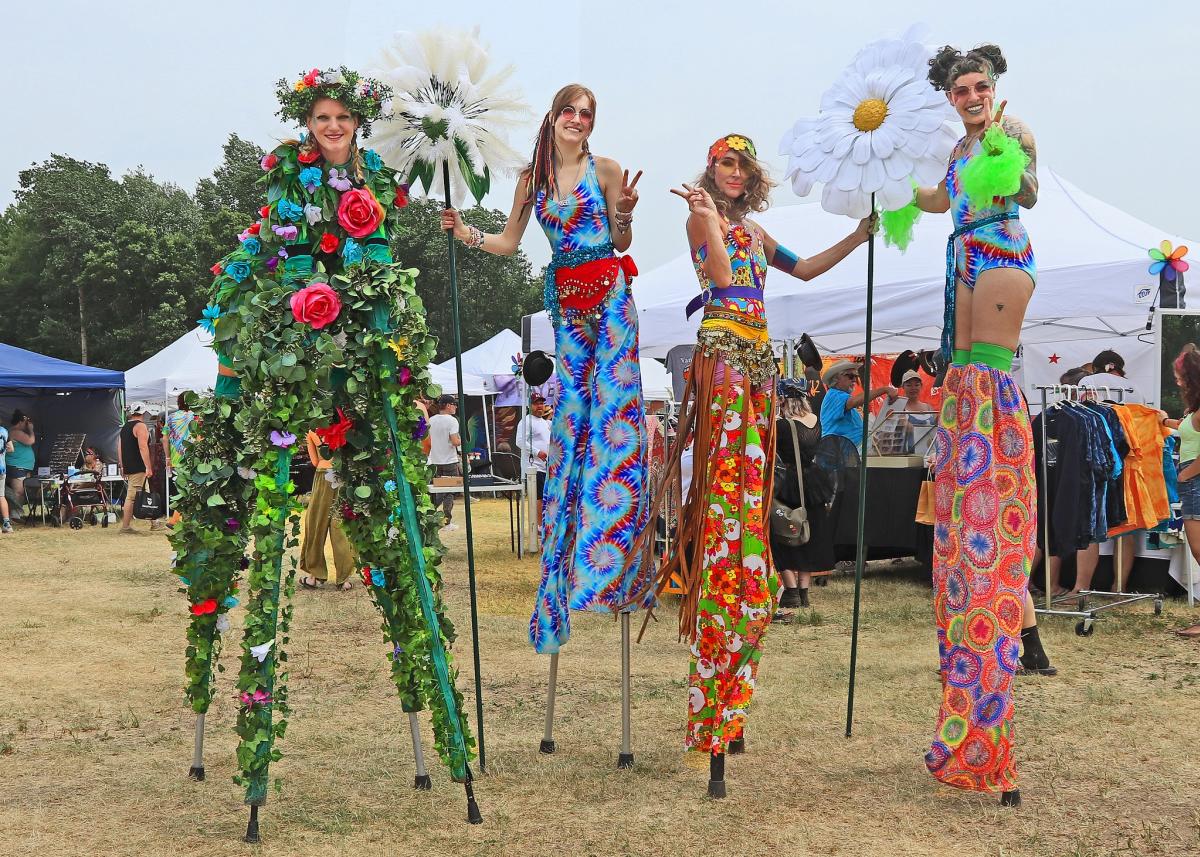 Stilt walkers at Hippie Fest