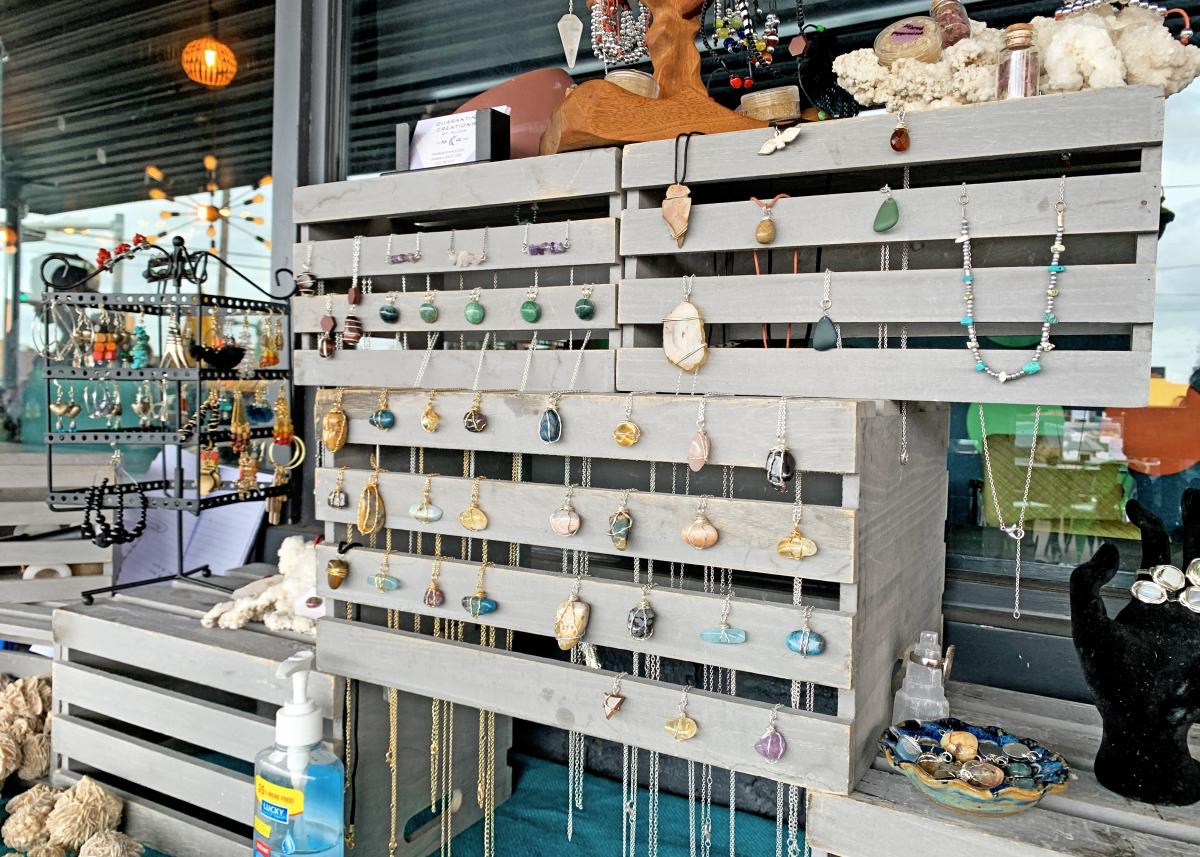 A display of handmade jewelry at the Friday Function market in Downtown San Marcos, TX