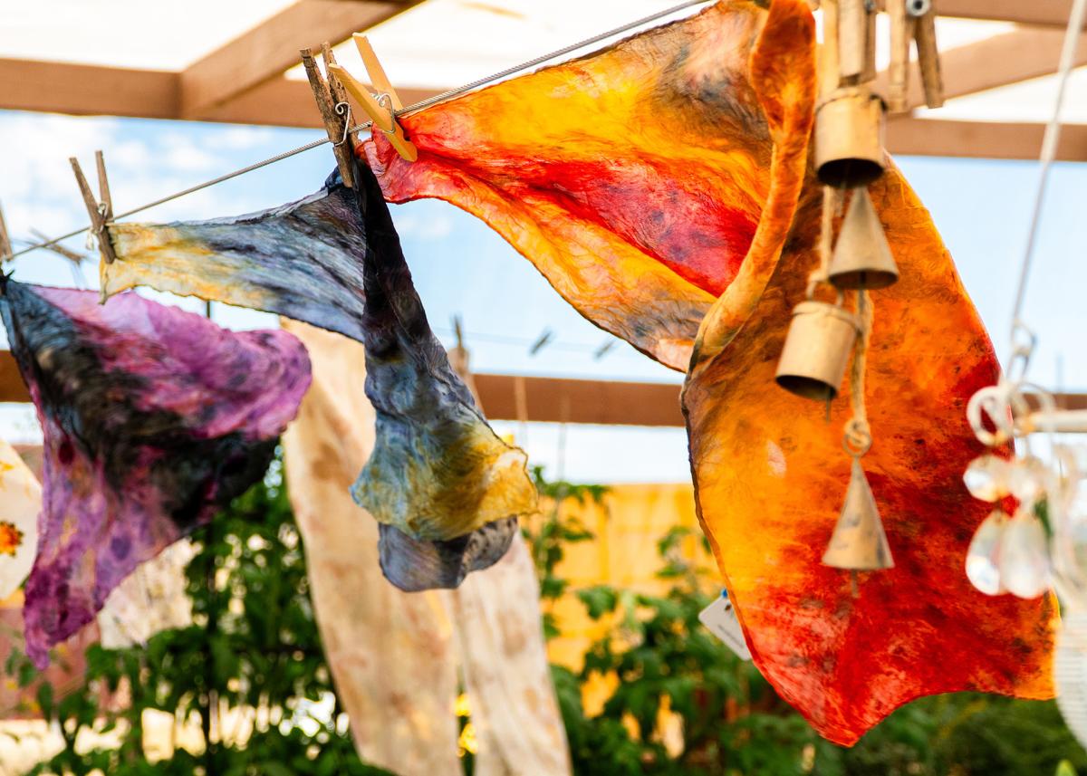 Hand dyed scarves drying in the wind