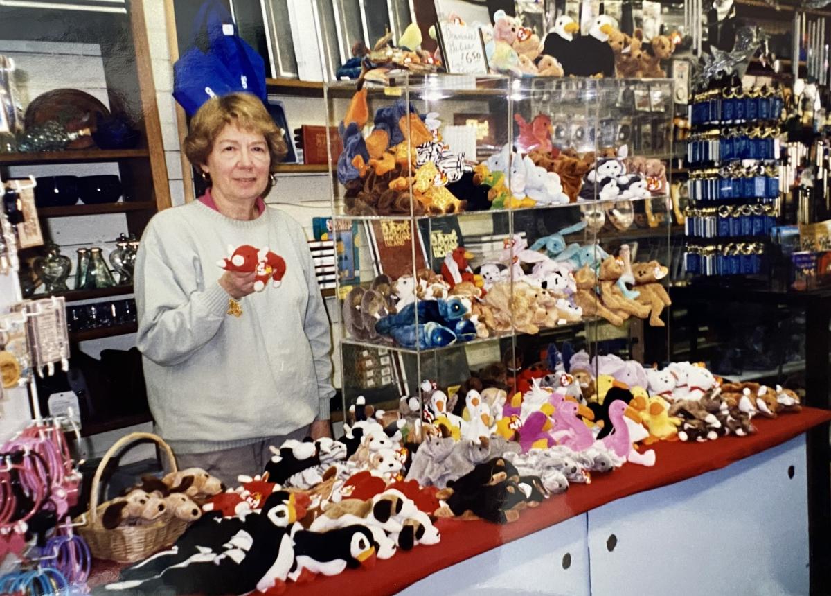 Beverly Benjamin stands with a collection of beanie babies inside Benjamin of Mackinac