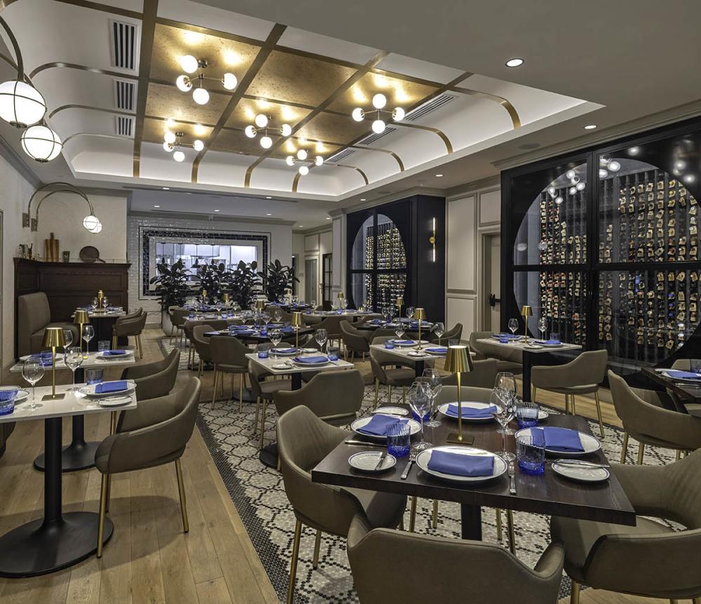 Elegant dining room at La Serre in The Vanguard, Autograph Collection