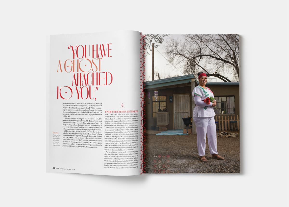 Magazine spread titled "You Have a Ghost Attached to You." Left page features text in red and black; right page shows a person in white holding flowers, standing in front of a small house.