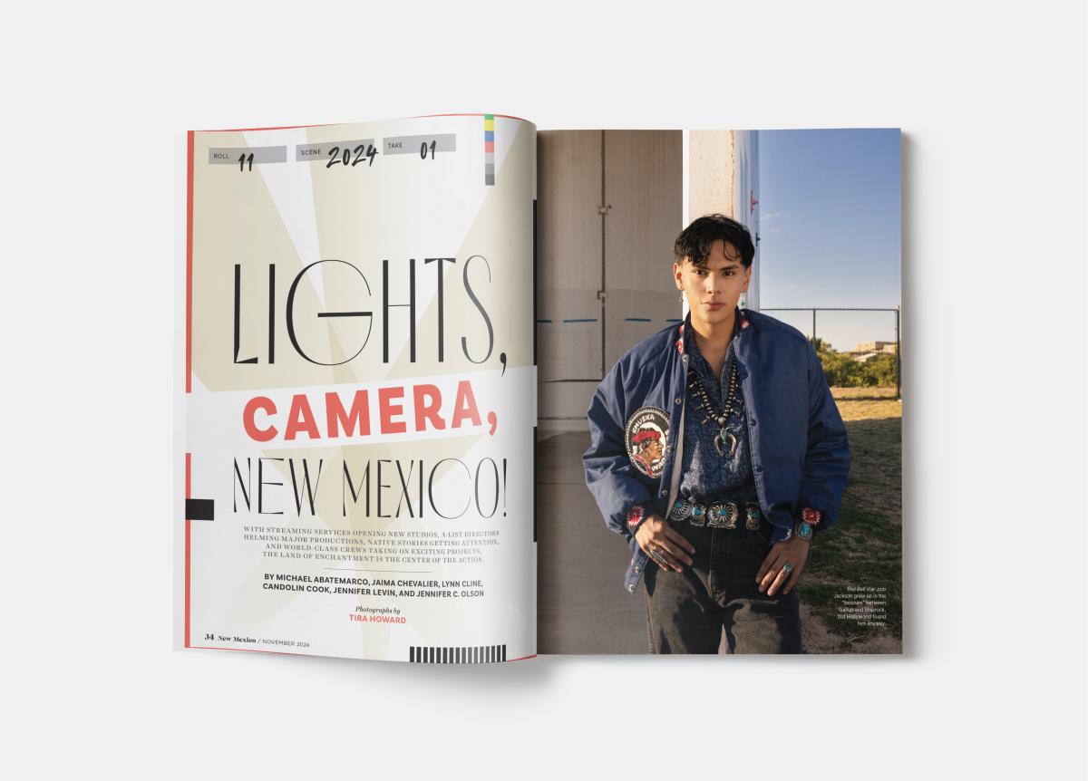 Open magazine shows "Lights, Camera, New Mexico!" in bold text. Right page features a person in a blue jacket standing outdoors, against a clear sky.