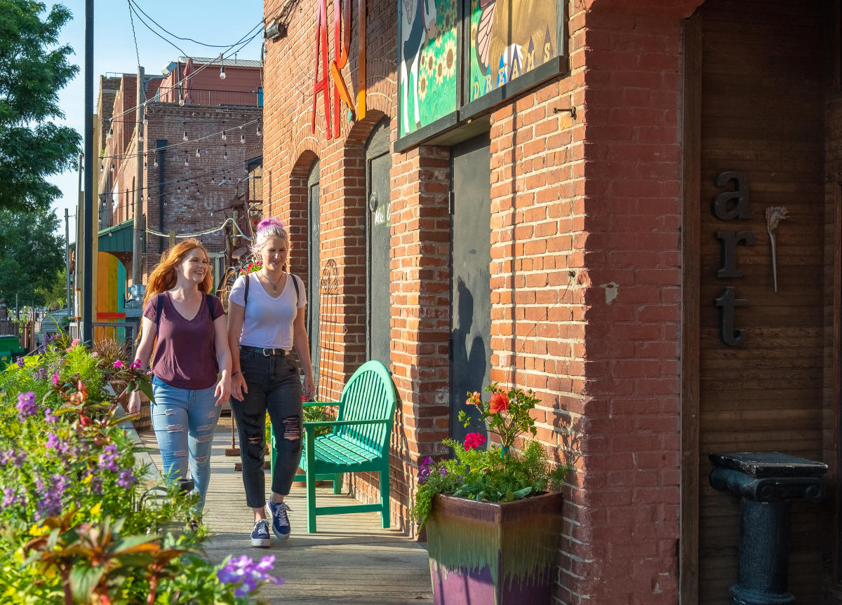 Two women shop in the Old Town district