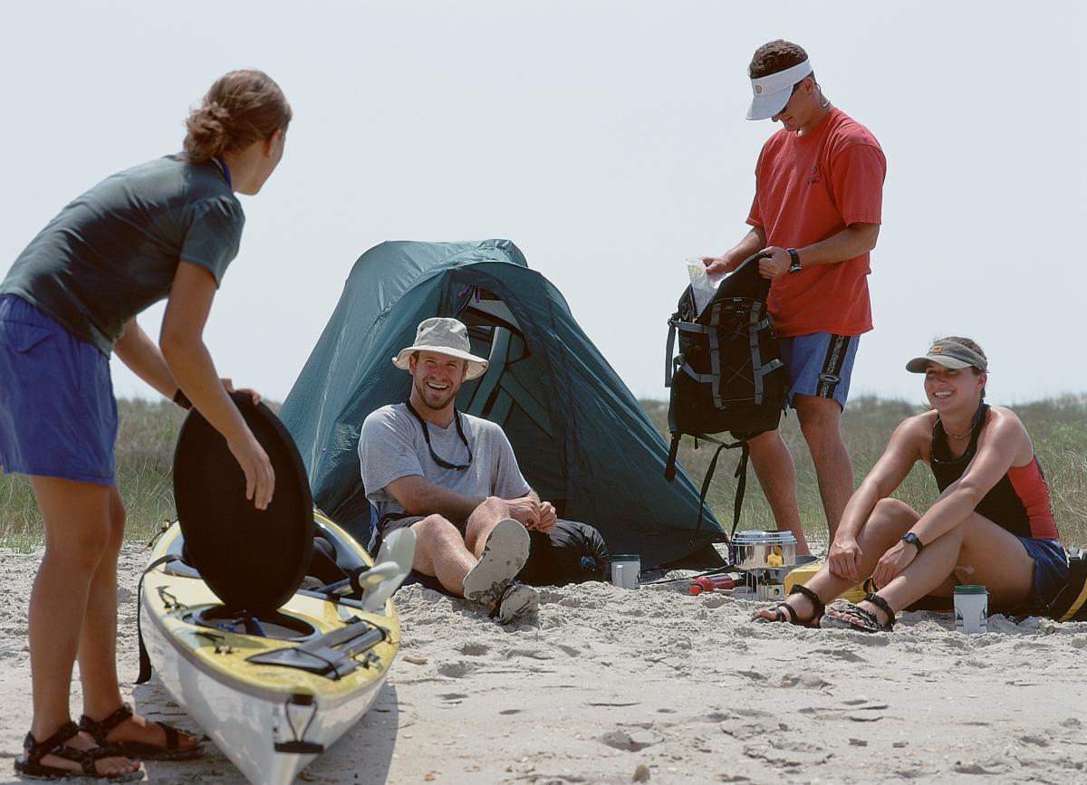 Couples camping on beach