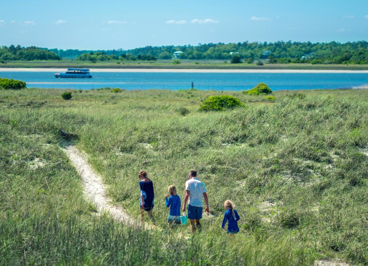 Family walking on Masonboro Island