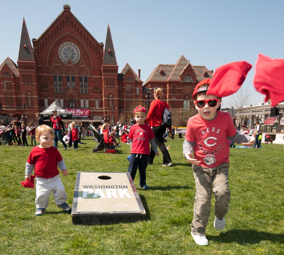 Kids playing cornhole during Reds Opening Day Celebration at Washington Park (photo: Lowry Photo)