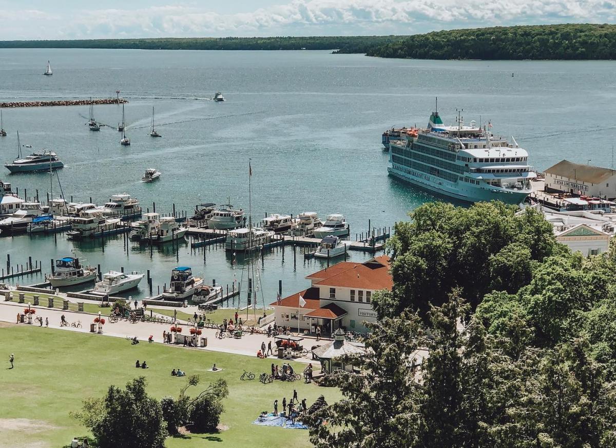 A cruise ship docks near the Mackinac Island marina