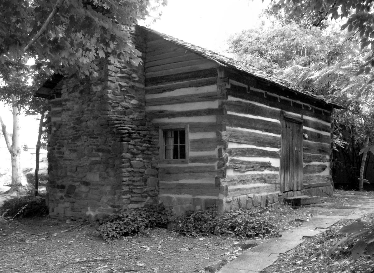 Martha Jane Ogle Cabin in front of Arrowmont