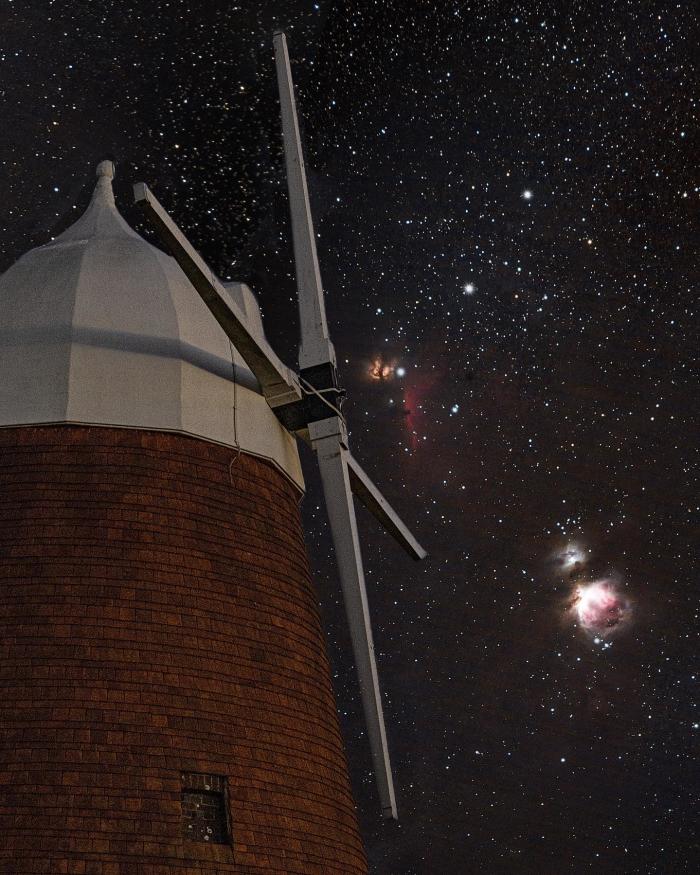 Halnaker Windmill with starry skies behind