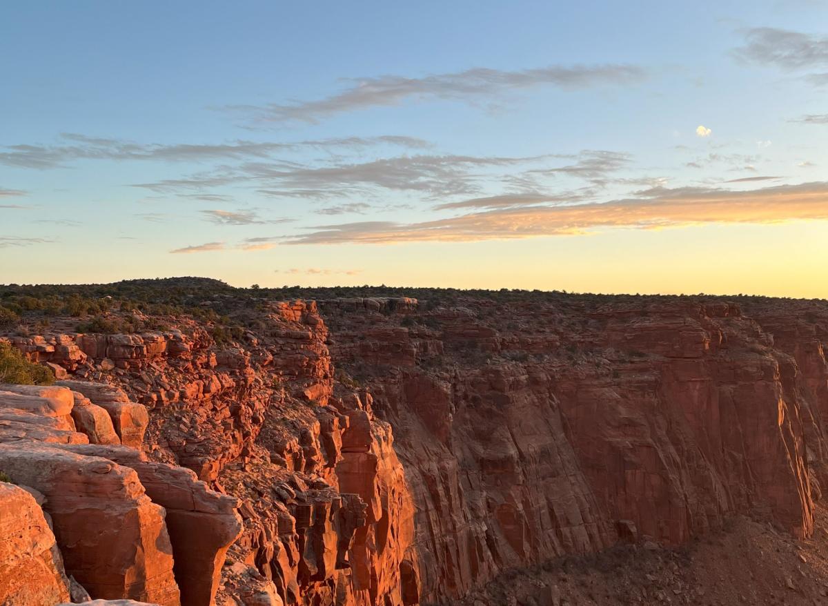 A canyon wall at sunset.