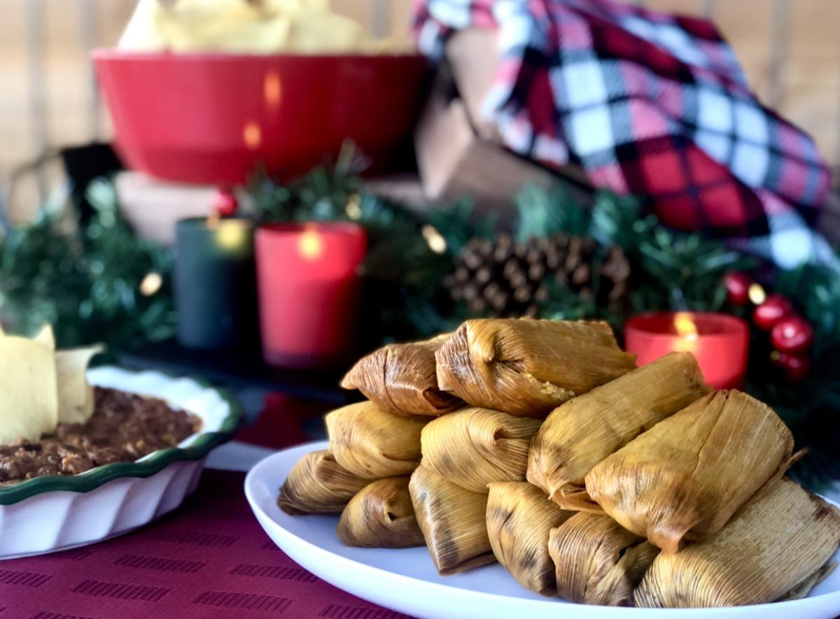 plate of pork tamales from Elmer's Tacos with holiday decor