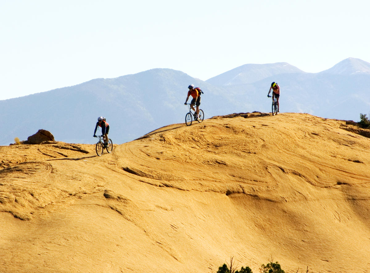 Mountain Bikers on Slickrock in Arches National Park