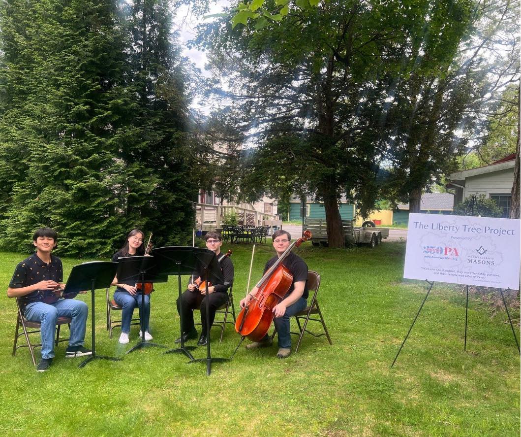 Musicians with their instruments at the Pike County America250PA tree planting.