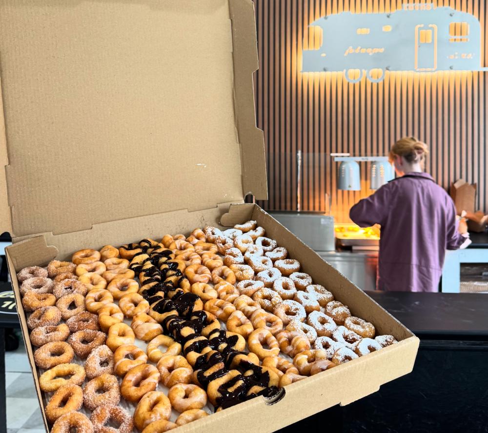 box of small assorted donuts at Tiny Little Donuts located inside Sweets on Main in downtown fort wayne