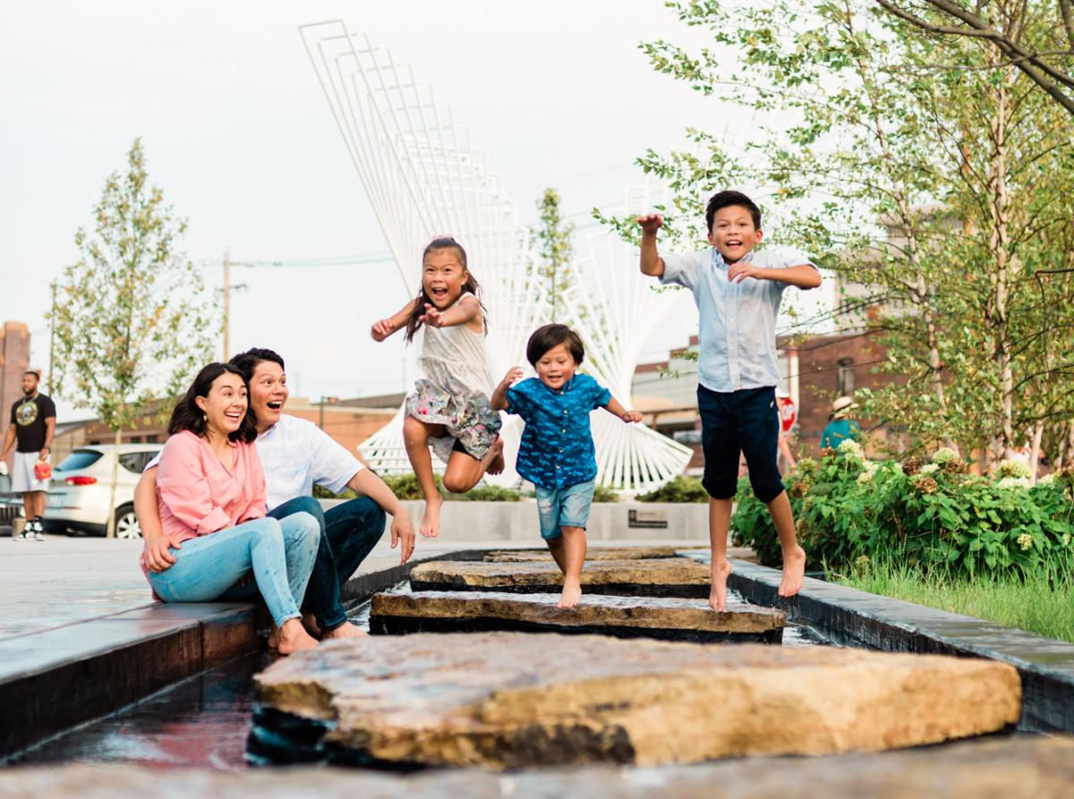 Family enjoying the Kids' Canal at Promenade Park in Downtown Fort Wayne