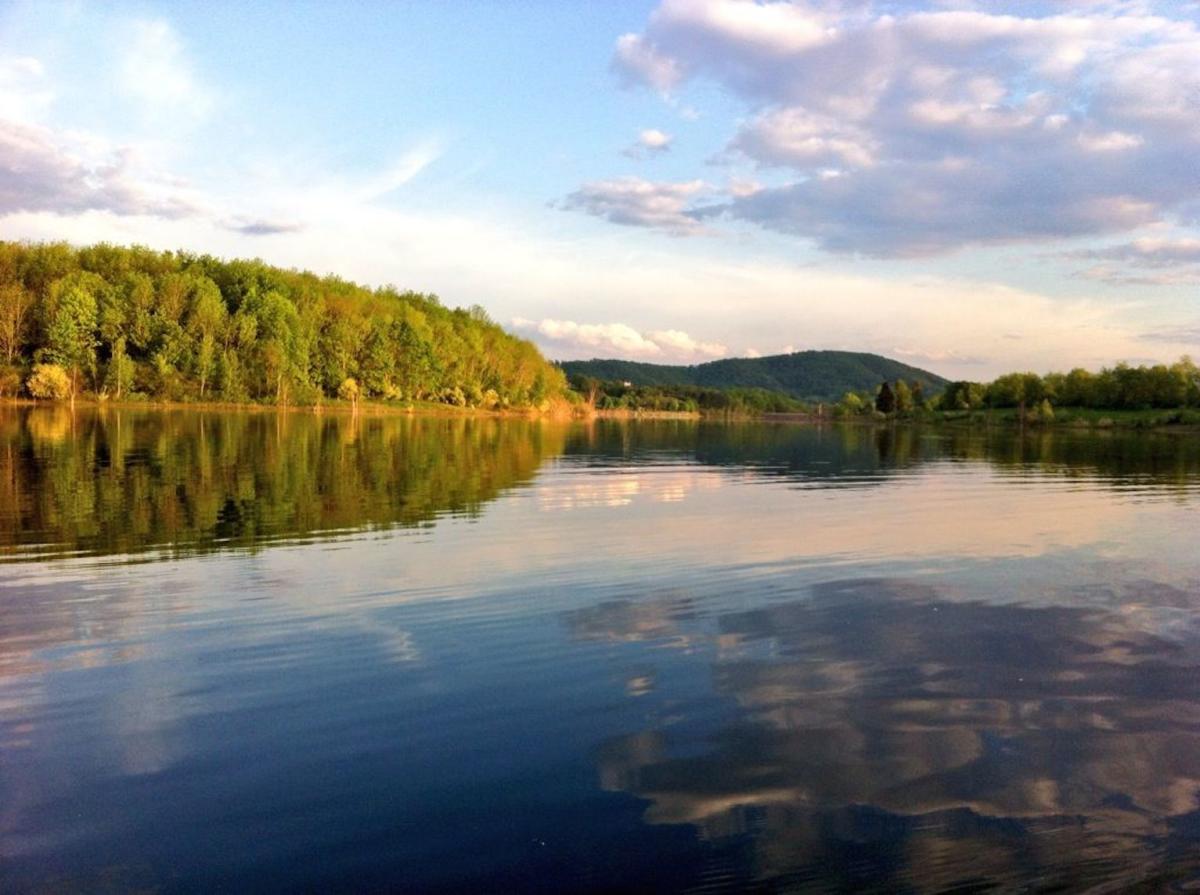 The colors of a sunset reflected on Leaser Lake In Lehigh Valley, PA