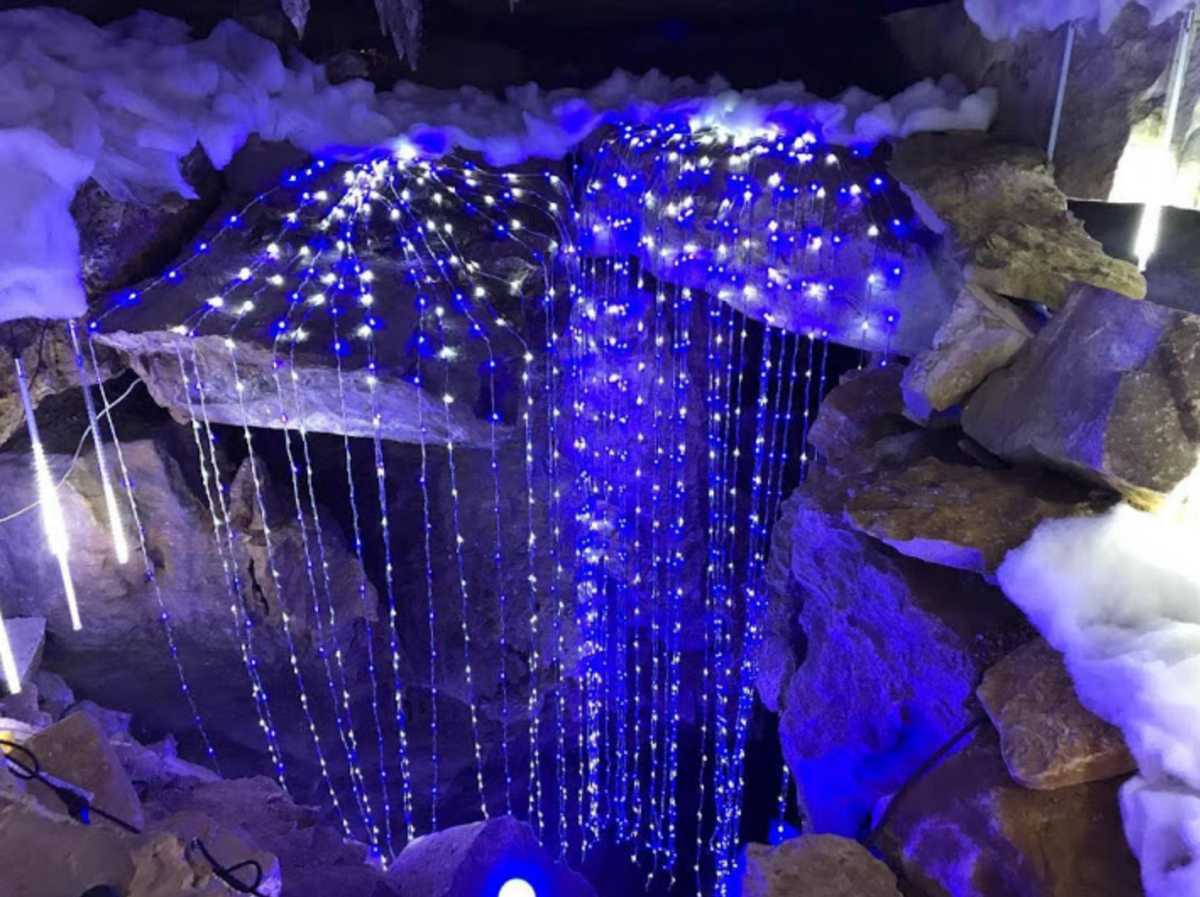 Lights hang from rocks inside Rickwood Caverns