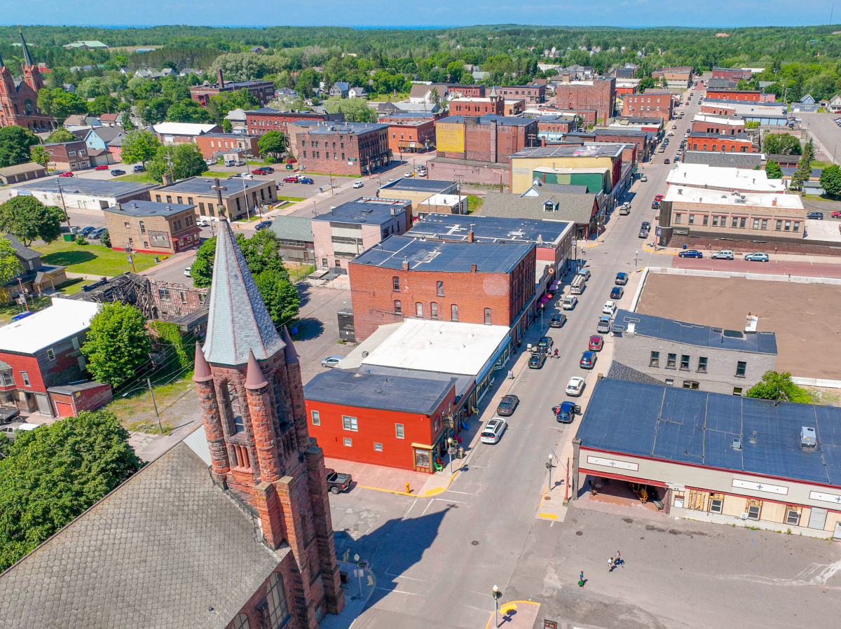 Aerial of fifth street in calumet showing churches and buildings
