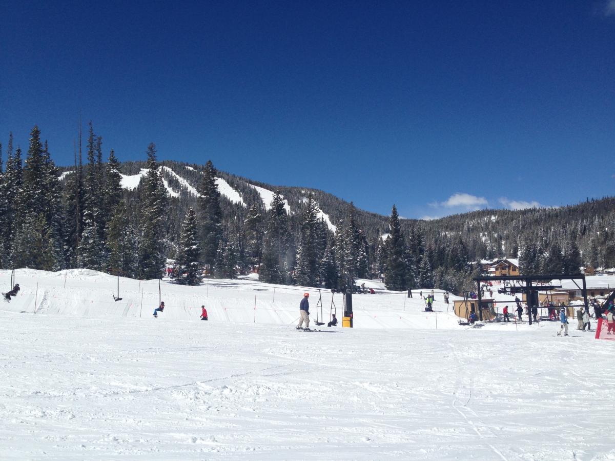 Skiers and snowboarders enjoying the powdery white snow at Eldora Mountain Resort in Boulder, CO.