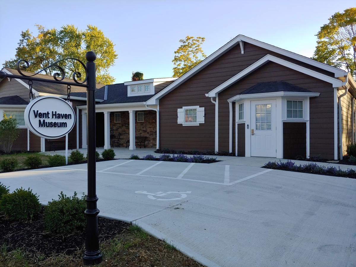Image is of the outside, front facade of the Vent Haven Museum.