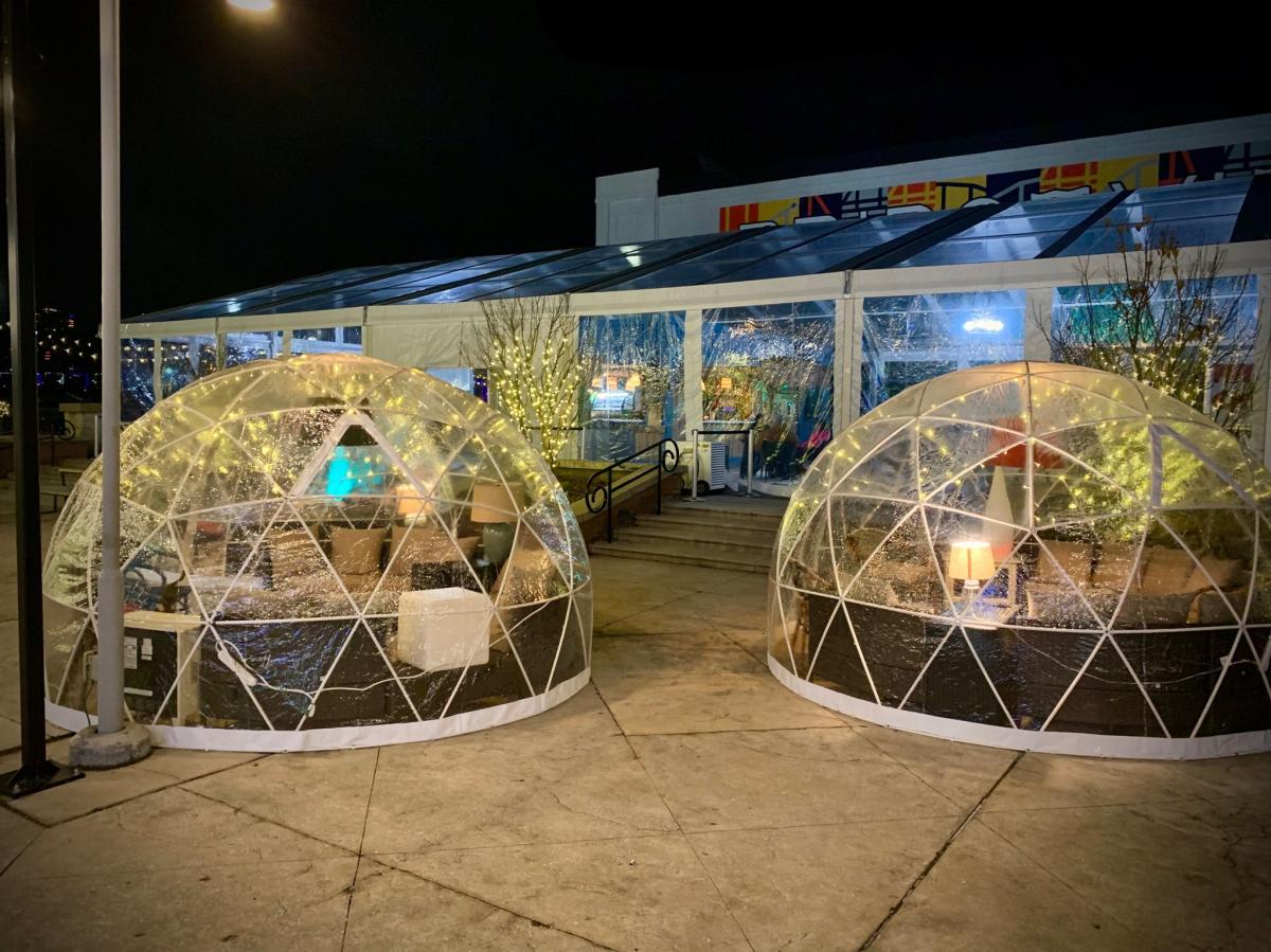 Two igloos at night on Newport on the Levee for enjoying drinks from Kon Tiki