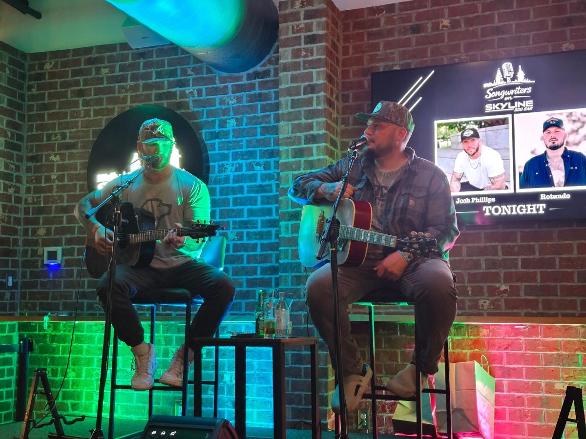 Performers play at a songwriter's event at Shelby's Trio.